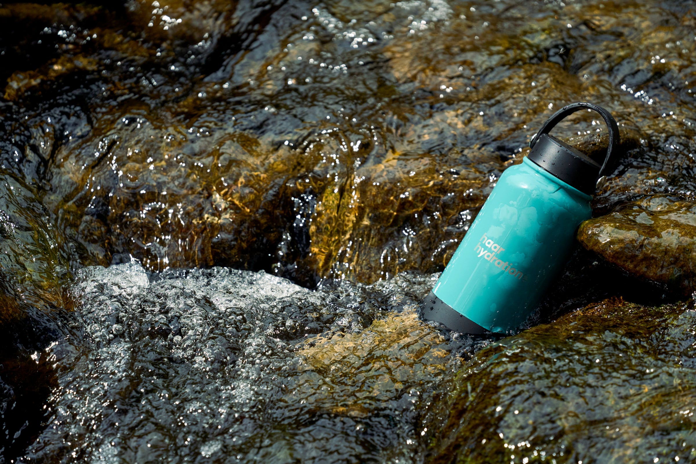 Water bottle in a stream